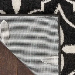 Black & Ivory Quatrefoil Indoor/Outdoor Rug, 8x10