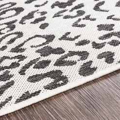 Cauli Black Leopard Print Outdoor Rug, 7x7