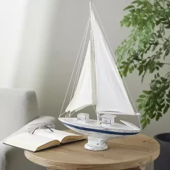 Coastal White and Blue Sailboat Statue