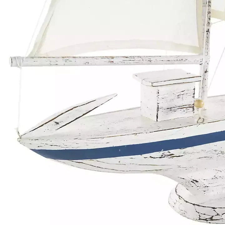 Coastal White and Blue Sailboat Statue