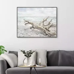 Driftwood On The Beach Framed Canvas Art Print