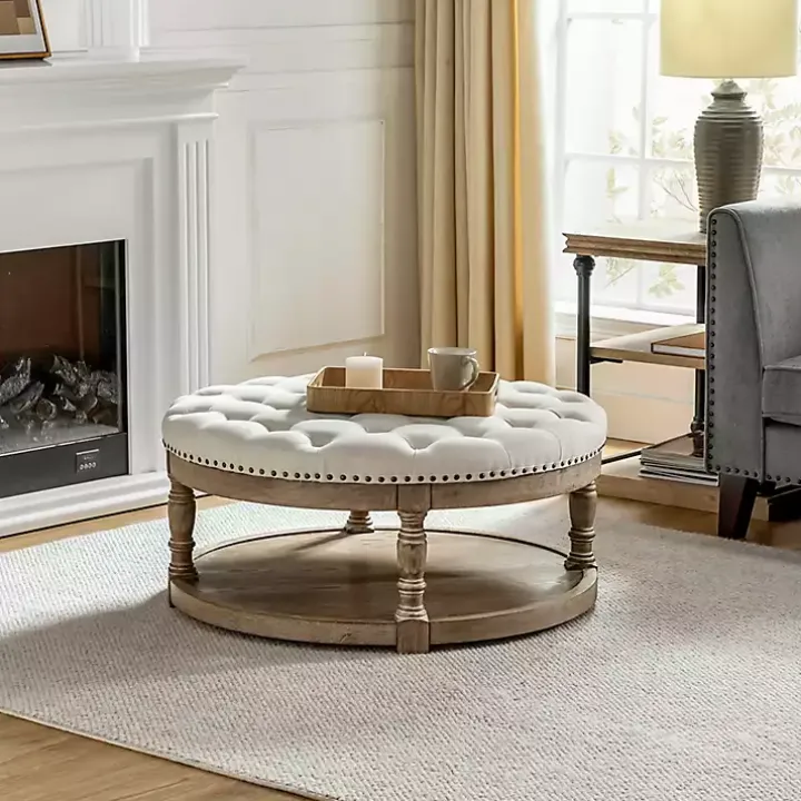 Round Ivory Cepheus Tufted Ottoman